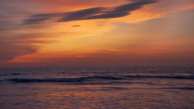 View of the sunset over the sea with gentle waves Bangladesh. View of the sunset over the sea with gentle waves Bangladesh.