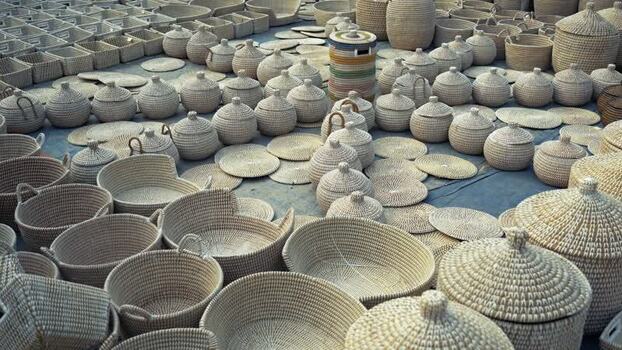 View of hand woven wicker baskets displayed on the ground Bangladesh. View of hand woven wicker baskets displayed on the ground Bangladesh.
