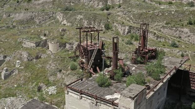 Aerial view of abandoned factory in Caucasus Mountains Russia.