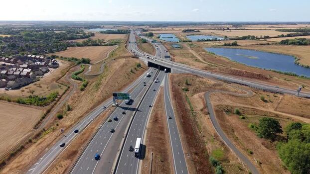 Aerial view of A1 motorway traffic flow in Huntingdon United Kingdom. Aerial view of A1 motorway traffic flow in Huntingdon United Kingdom.
