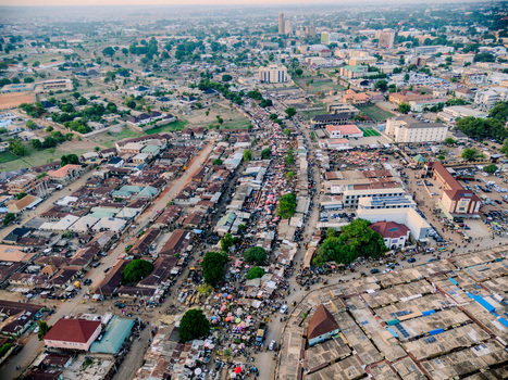 Aerial view of the bustling central market with crowded streets colorful stalls and dense urban architecture in Kaduna Kaduna Nigeria. Aerial view of the bustling central market with crowded streets colorful stalls and dense urban architecture in Kaduna Kaduna Nigeria.