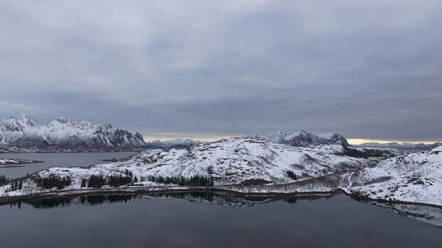 Aerial view of snow covered Lofoten mountains Norway.