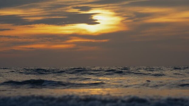 View of the golden sunset over the ocean waves Bangladesh. View of the golden sunset over the ocean waves Bangladesh.