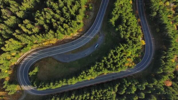 Aerial view of winding road in Transylvania Romania.
