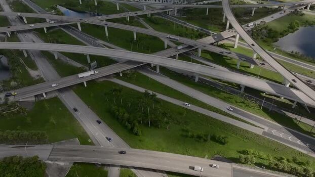 Aerial view of sawgrass interchange and traffic United States.