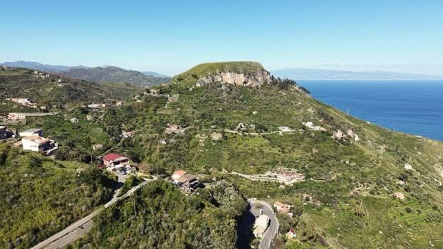 Aerial view of the rocky hills and coastal landscape in Italy. Aerial view of the rocky hills and coastal landscape in Italy.