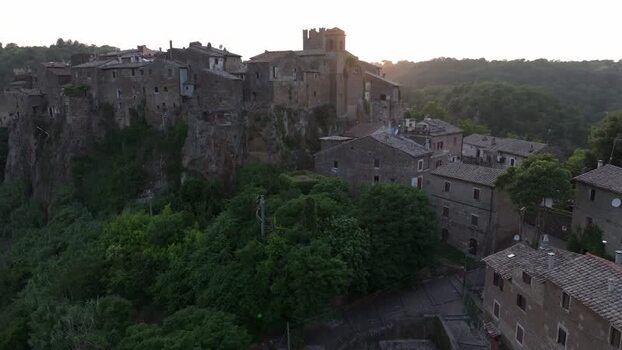 Aerial view of Calcata village on cliff Italy. Aerial view of Calcata village on cliff Italy.