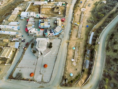Aerial view of Fort Munro Bazar showing the central square surrounding shops and winding roads in Dera Ghazi Khan Punjab Pakistan.