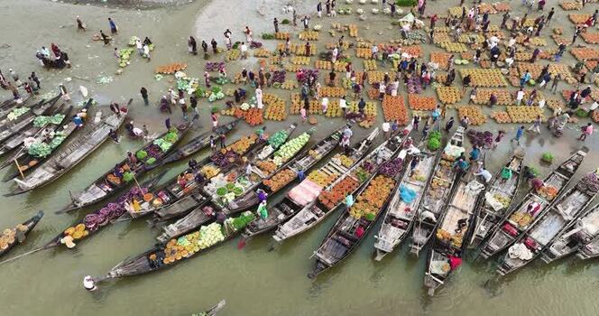 Aerial view of a floating market with wooden boats Bangladesh. Aerial view of a floating market with wooden boats Bangladesh.