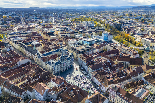 Aerial view of the Hauptplatz with its intricate architecture and bustling streets below a vibrant tapestry of urban life unfurls Graz Styria Austria.