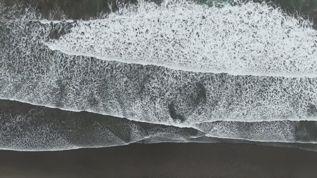 Aerial view of waves on a black sand beach Costa Rica. Aerial view of waves on a black sand beach Costa Rica.