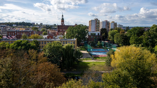 Aerial view of the vibrant cityscape blending historic architecture with modern buildings lush greenery and bright skies Bydgoszcz Województwo kujawsko pomorskie Poland. Aerial view of the vibrant cityscape blending historic architecture with modern buildings lush greenery and bright skies Bydgoszcz Województwo kujawsko pomorskie Poland.