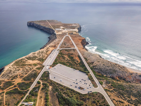 Aerial view of Sagres fortress Fortaleza de Sagres and the lighthouse on the cliff facing the Atlantic Ocean Sagres Algarve region Portugal.