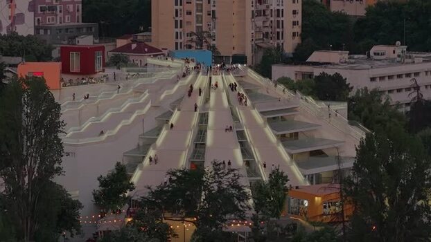 Aerial view of people walking on the Pyramid of Tirana Albania.