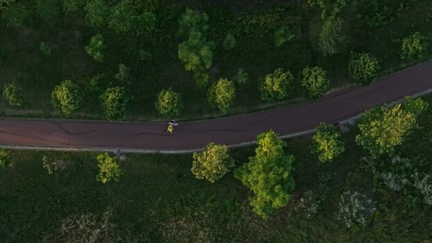 Aerial view of a person on a park path in Tirane Albania. Aerial view of a person on a park path in Tirane Albania.