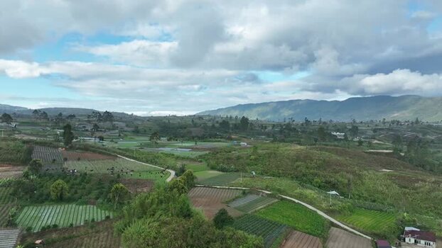 Aerial view of Alahan Panjang fields and hills Indonesia. Aerial view of Alahan Panjang fields and hills Indonesia.