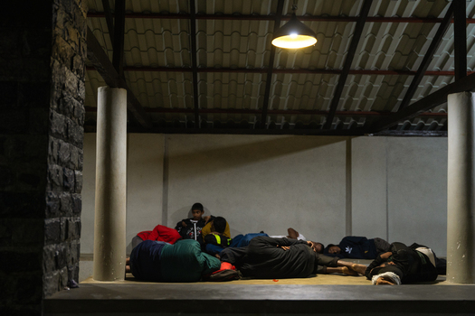 Ratnapura Sri Lanka 22 February 2026 View of pilgrims sleeping on the floor of a shelter under a dim light during the night ascent to Adam s Peak.