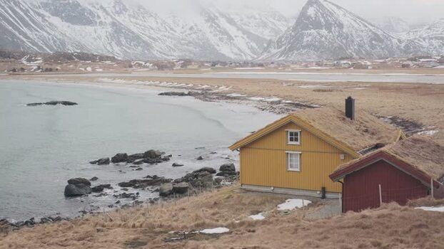 View of traditional houses by a bay Norway.