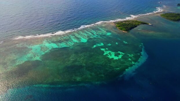 Aerial view of Guanaja island and coral reefs Honduras. Aerial view of Guanaja island and coral reefs Honduras.