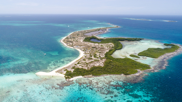 Aerial view of Los Roques archipelago with turquoise waters coral reefs and sandy beaches Los Roques Dependencias Federales Venezuela. Aerial view of Los Roques archipelago with turquoise waters coral reefs and sandy beaches Los Roques Dependencias Federales Venezuela.