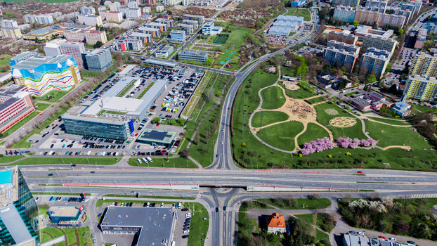 Aerial view of the vibrant cityscape with modern buildings green spaces and bustling roadways capturing the dynamic urban landscape Prague Prague Czechia. Aerial view of the vibrant cityscape with modern buildings green spaces and bustling roadways capturing the dynamic urban landscape Prague Prague Czechia.