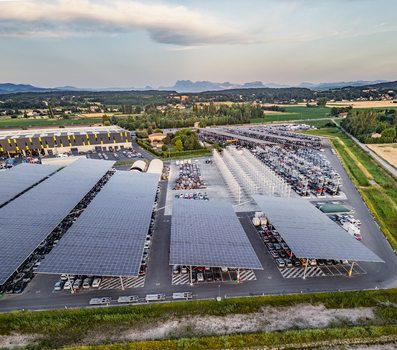 Livron sur Drome France 20 June 2026 Aerial view of a vehicle salvage yard with rows of damaged and end of life cars parked under large solar panel canopies. Livron sur Drome France 20 June 2026 Aerial view of a vehicle salvage yard with rows of damaged and end of life cars parked under large solar panel canopies.
