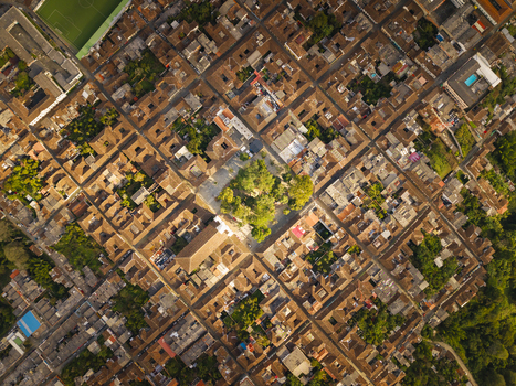 Aerial view of terracotta rooftops cascading in geometric harmony punctuated by verdant plazas and sun kissed streets Salamina Caldas Colombia. Aerial view of terracotta rooftops cascading in geometric harmony punctuated by verdant plazas and sun kissed streets Salamina Caldas Colombia.