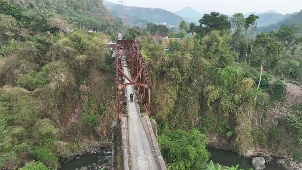 Aerial view of a rusty bridge in Soreang Indonesia. Aerial view of a rusty bridge in Soreang Indonesia.