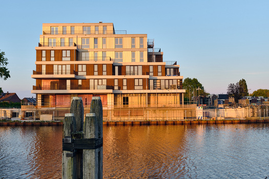 Alkmaar Netherlands 11 May 2026 View of the modern residential building development along the Alkmaar Kanaal in the Overstad zone during golden hour. Alkmaar Netherlands 11 May 2026 View of the modern residential building development along the Alkmaar Kanaal in the Overstad zone during golden hour.