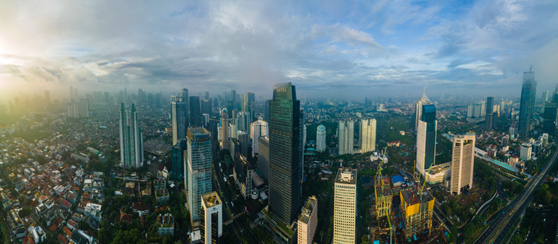 South Jakarta Indonesia 10 January 2026 Aerial view of Menara Astra and the modern skyscrapers of the central business district under a cloudy sky. South Jakarta Indonesia 10 January 2026 Aerial view of Menara Astra and the modern skyscrapers of the central business district under a cloudy sky.