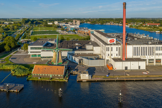 Zaandam Netherlands 26 July 2026 Aerial view of Duyvis Production B.V. factory with its iconic windmill industrial buildings and surrounding waterways in the Noord Holland region.