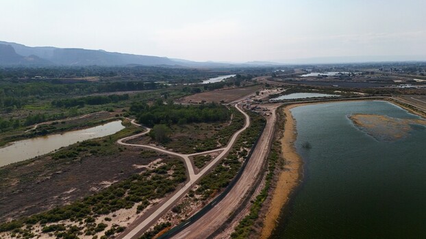 Grand Junction Colorado United States 03 July 2026 Aerial view of retention ponds surrounded by walking paths natural vegetation and the Colorado River in the distance. Grand Junction Colorado United States 03 July 2026 Aerial view of retention ponds surrounded by walking paths natural vegetation and the Colorado River in the distance.