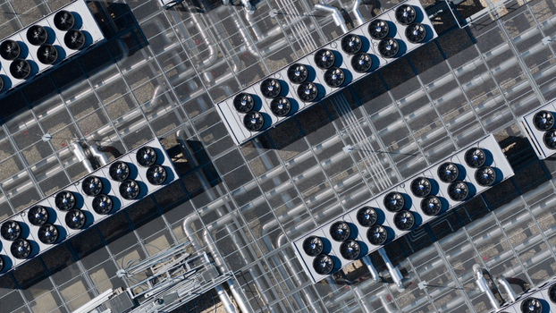 Aerial view of industrial cooling units and ventilation fans at Switch Datacenters AMS4 in Diemen Noord Holland Netherlands. Aerial view of industrial cooling units and ventilation fans at Switch Datacenters AMS4 in Diemen Noord Holland Netherlands.