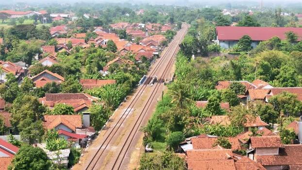 Aerial view of railway tracks through Pekalongan Indonesia. Aerial view of railway tracks through Pekalongan Indonesia.