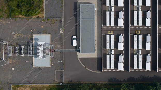 Aerial view of Battery Energy Storage Park Beside Traditional Power Plant Aerial view of Battery Energy Storage Park Beside Traditional Power Plant