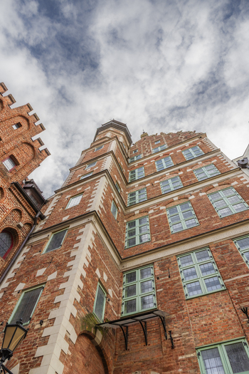 Gdansk Poland 07 September 2026 View of a historic brick building with ornate gables and many windows under a cloudy sky in Gdansk Poland. Gdansk Poland 07 September 2026 View of a historic brick building with ornate gables and many windows under a cloudy sky in Gdansk Poland.