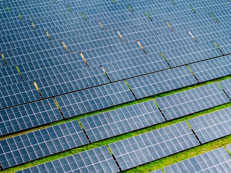 Aerial view of rows of solar panels in a solar farm in Olaine Olaine Municipality Latvia. Aerial view of rows of solar panels in a solar farm in Olaine Olaine Municipality Latvia.