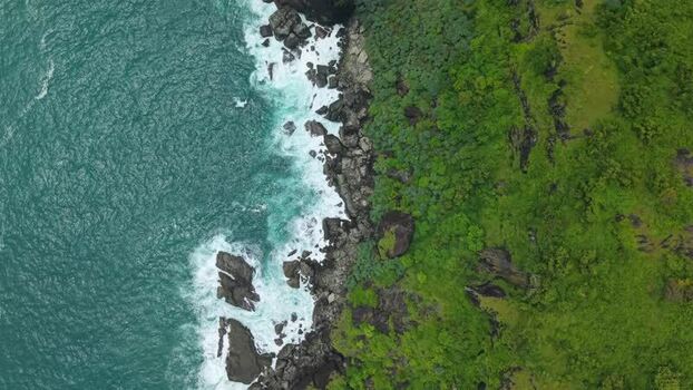 Aerial view of Bukit Pengilon cliffs and ocean Indonesia.
