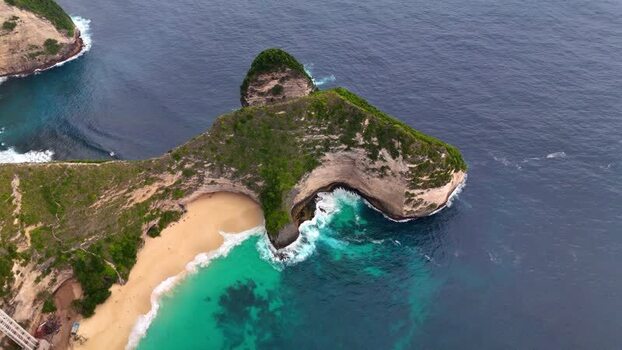 Aerial view of Kelingking Beach and the T Rex cliff formation Indonesia. Aerial view of Kelingking Beach and the T Rex cliff formation Indonesia.