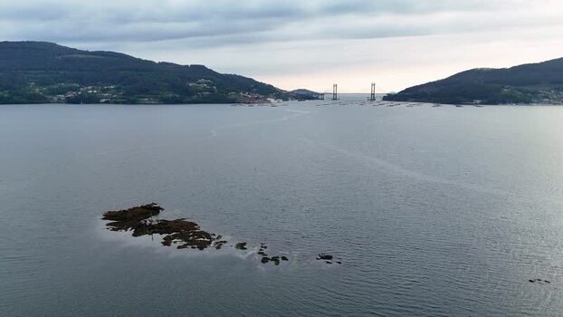 Aerial view of Illa Corveiro and Rande Bridge in Pontevedra Spain.
