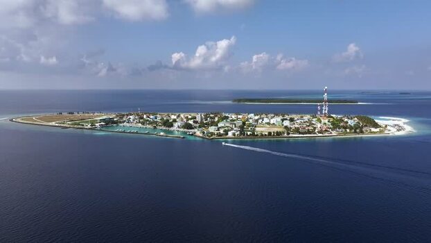 Aerial view of Eydhafushi island and its harbor Maldives. Aerial view of Eydhafushi island and its harbor Maldives.
