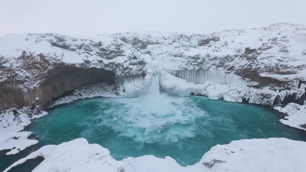 View of frozen Aldeyjarfoss waterfall in winter Iceland.