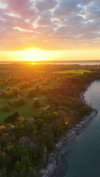 Aerial view of sunset over Bockholmwik coastline Germany.