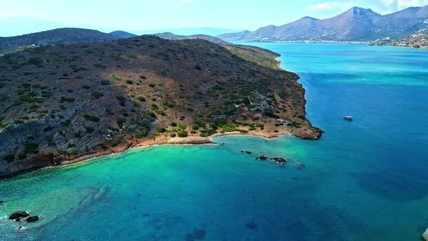 Aerial view of Crete coastline with turquoise waters Greece.