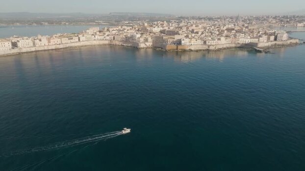 Aerial view of the Island of Ortigia and the blue sea Italy. Aerial view of the Island of Ortigia and the blue sea Italy.