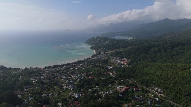 Aerial view of Mahe coastline and tropical hills Seychelles.
