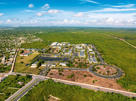 Aerial view of Base de Infanteria de Marina Valm. Manuel Ramon Montes Arache with military buildings roads and a roundabout in Boca Chica Santo Domingo Dominican Republic. Aerial view of Base de Infanteria de Marina Valm. Manuel Ramon Montes Arache with military buildings roads and a roundabout in Boca Chica Santo Domingo Dominican Republic.