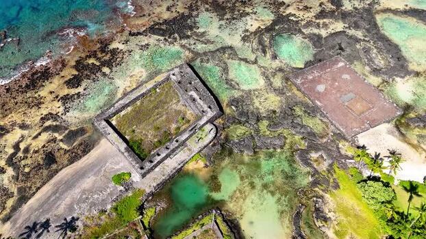Aerial view of ancient heiau ruins at Kahaluu Beach Park United States.
