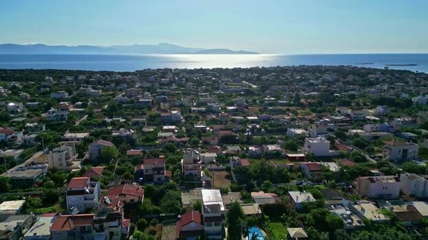 Aerial view of a coastal town in Greece.