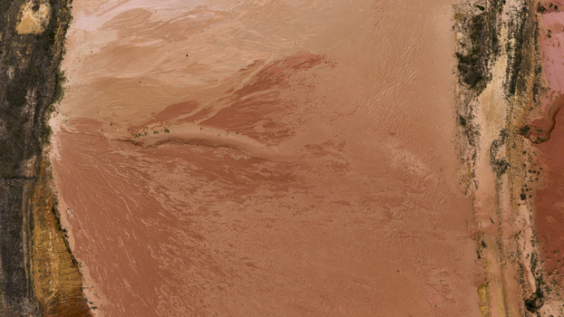 Aerial view of salt lake patterns with sand and mineral deposits in the remote landscape of Kalbarri Western Australia Australia. Aerial view of salt lake patterns with sand and mineral deposits in the remote landscape of Kalbarri Western Australia Australia.